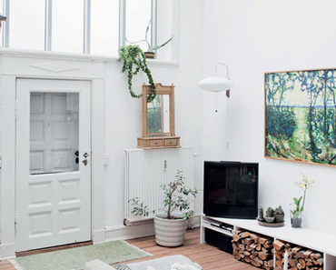 Une maison industrielle danoise aux airs de cottage romantique