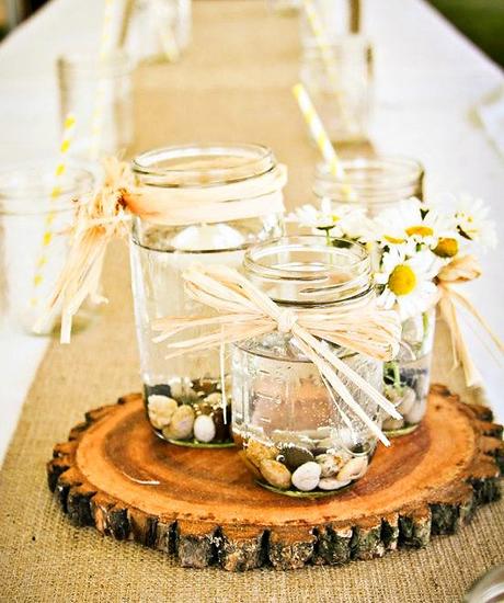 Centre de table mariage bocaux en verre.