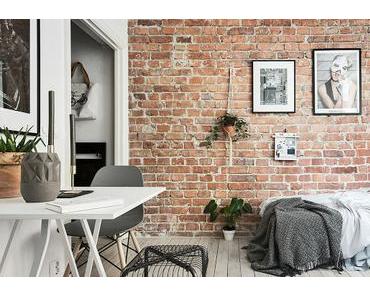 Suède / Studio de 20m² avec un mur de briques /